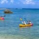 Serunya Bermain Kayak di Pantai Ujunggenteng Saat Libur Akhir Pekan
